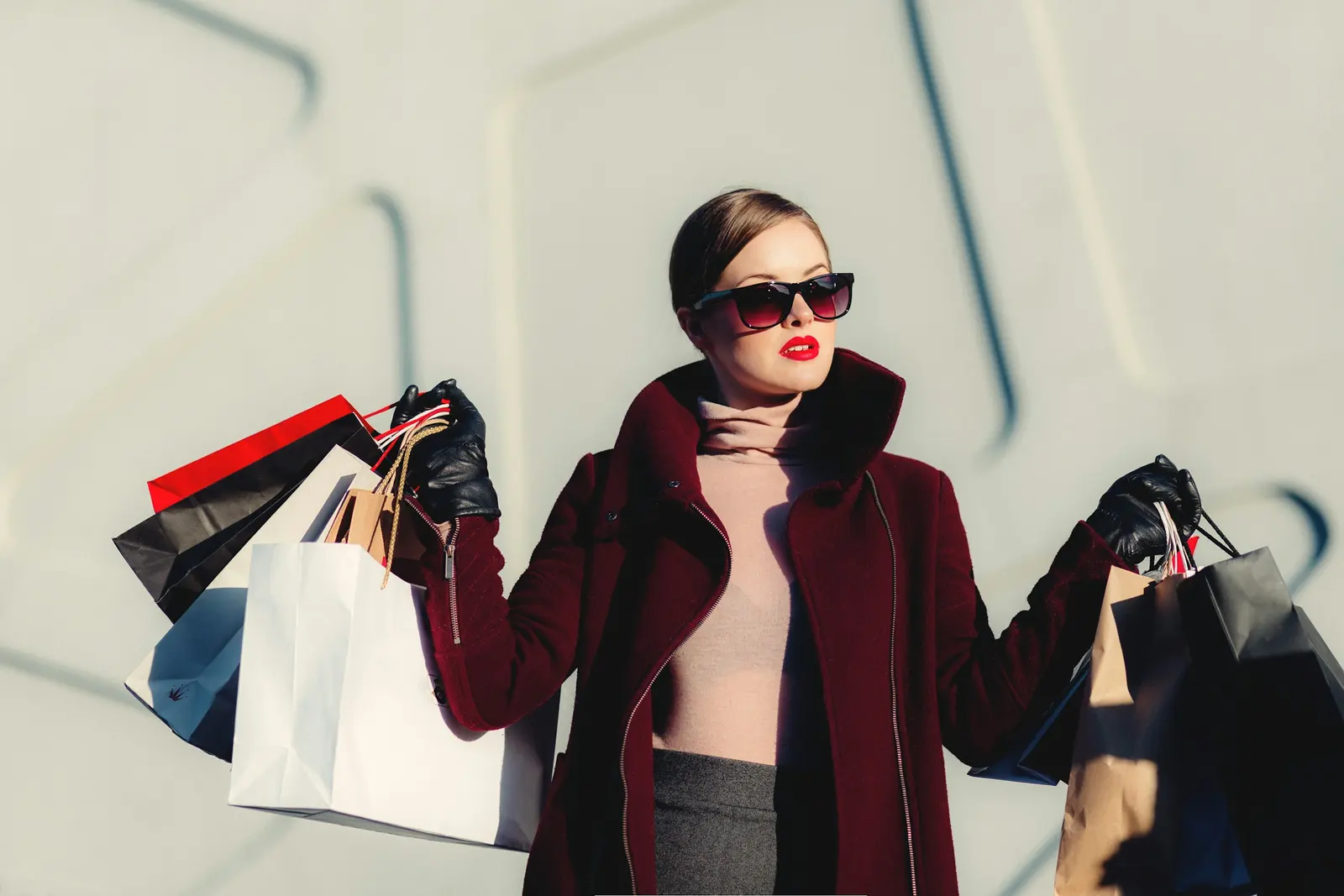 Shopper carrying bags from a shopping trip