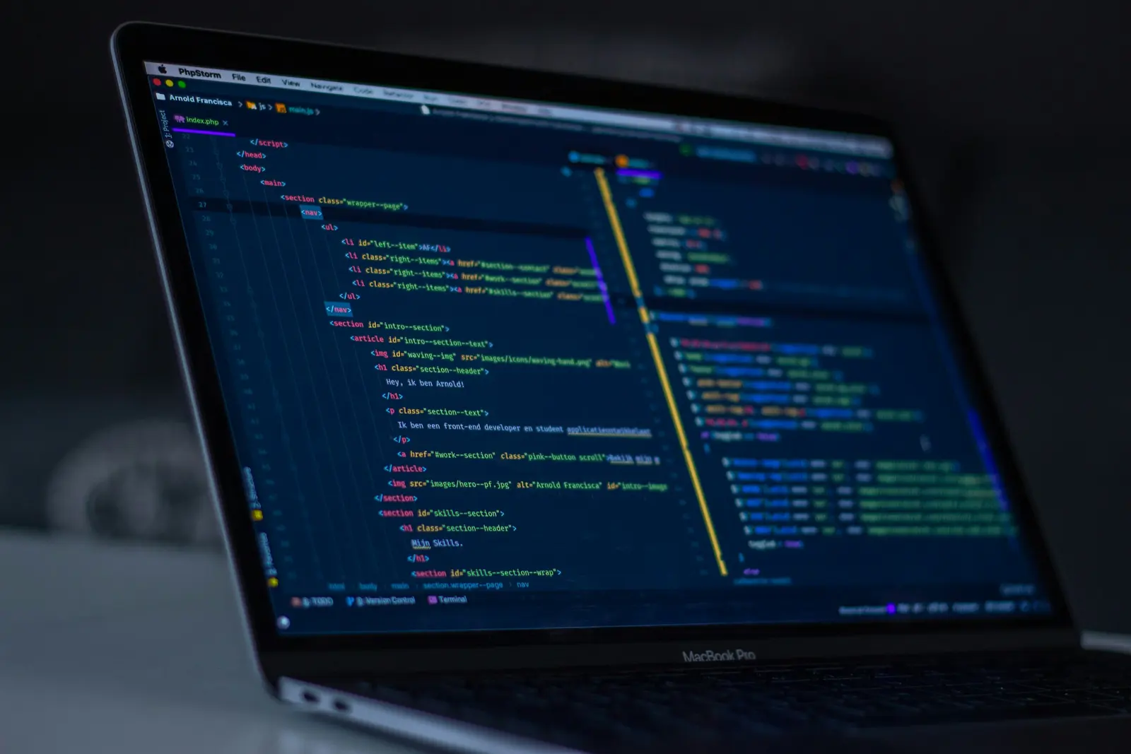 Theme code open on a laptop