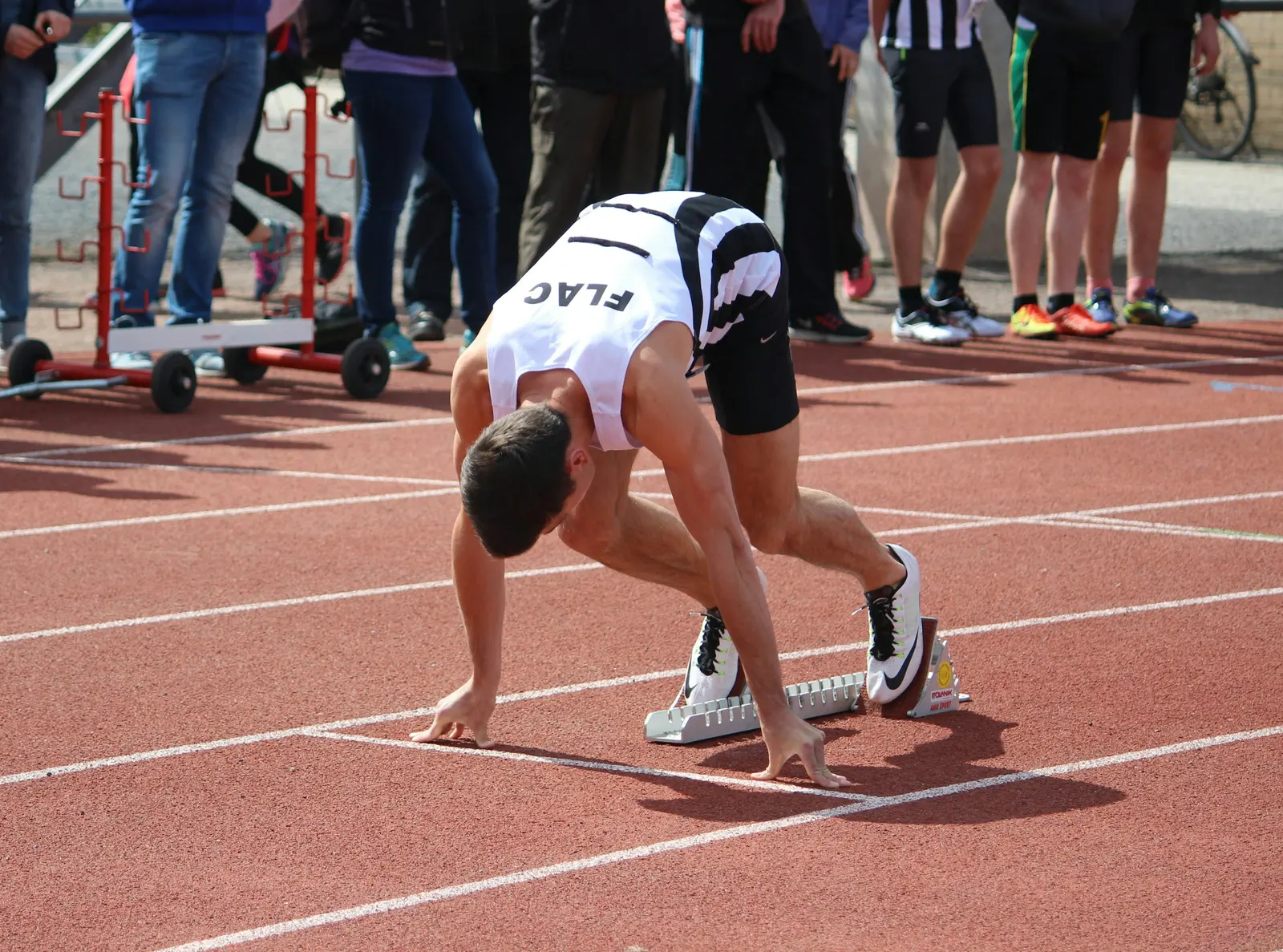 Sprinter in the blocks at the start line
